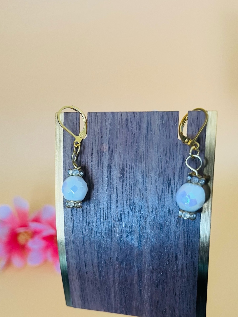Gold plated round white earrings with clear rhinestones spacers